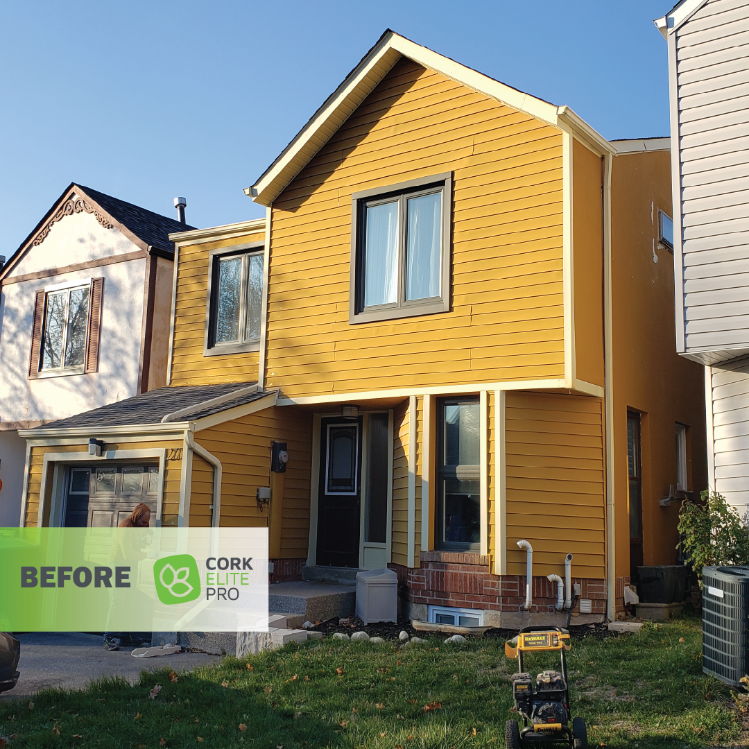 A charming yellow house with aluminum siding + EIFS.